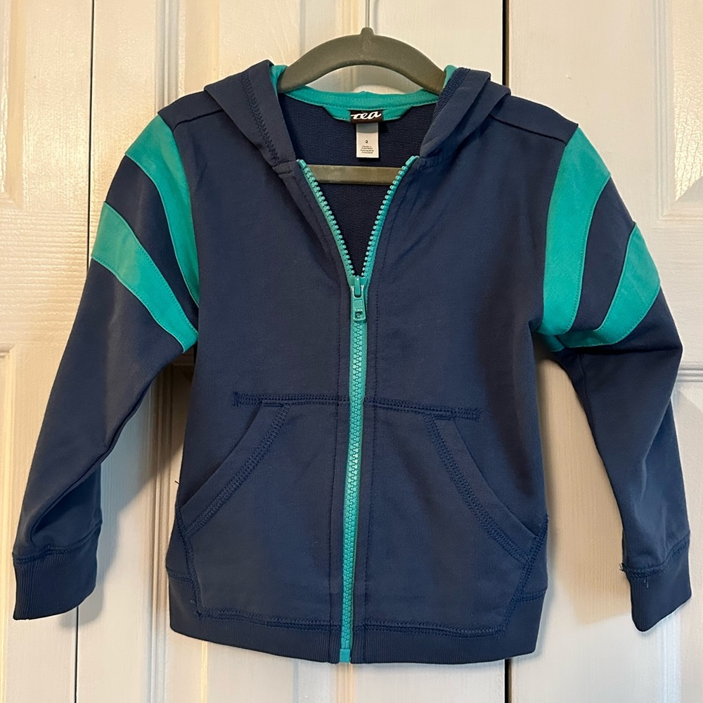 Tea Collection 2T sweatshirt with hood. Bluish-gray with teal accents.